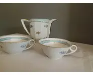 Tasses à thé et pot à lait Lourioux