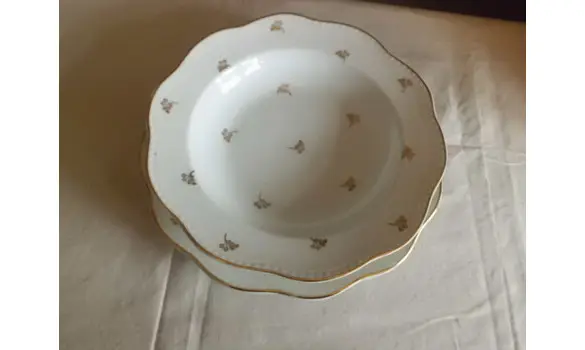 3 assiettes à soupe Limoges NL